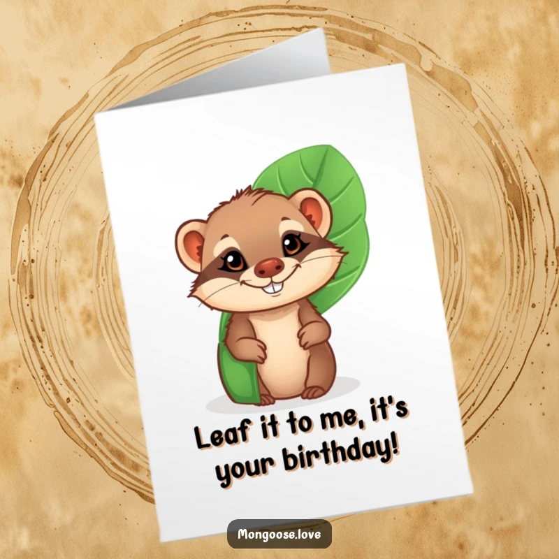 Funny Free Printable Birthday Card: Cheeky mongoose peeking from a leaf, grinning mischievously, perfect for a funny downloadable gift.